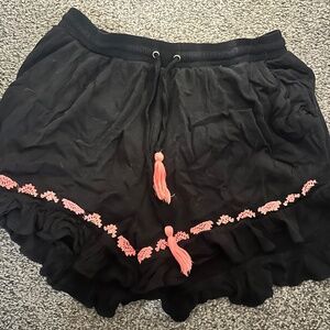 Black drawstring flared shorts